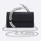 Black glitter evening clutch with crystal leaf handle and silver chain