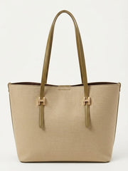 Beige textured shopper tote bag with gold buckle straps, front view