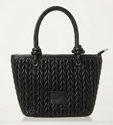 Black chevron quilted tote bag with knotted handles, front view