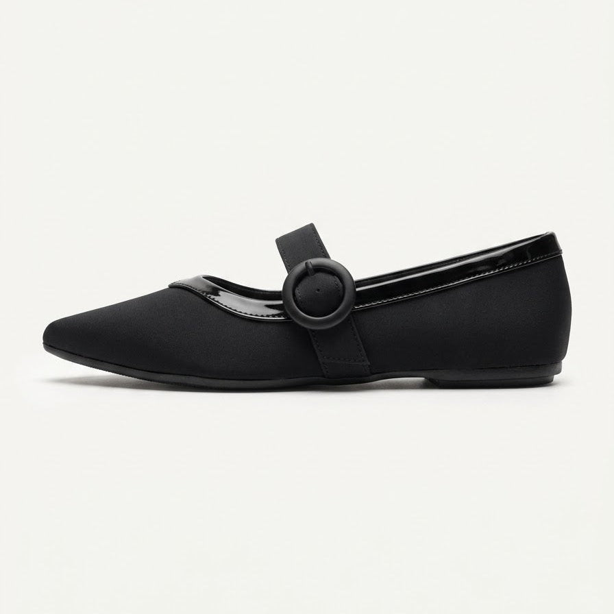 Black Mary Jane flat with a buckled instep strap, side view