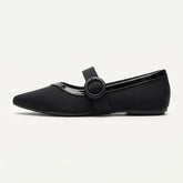 Black Mary Jane flat with a buckled instep strap, side view