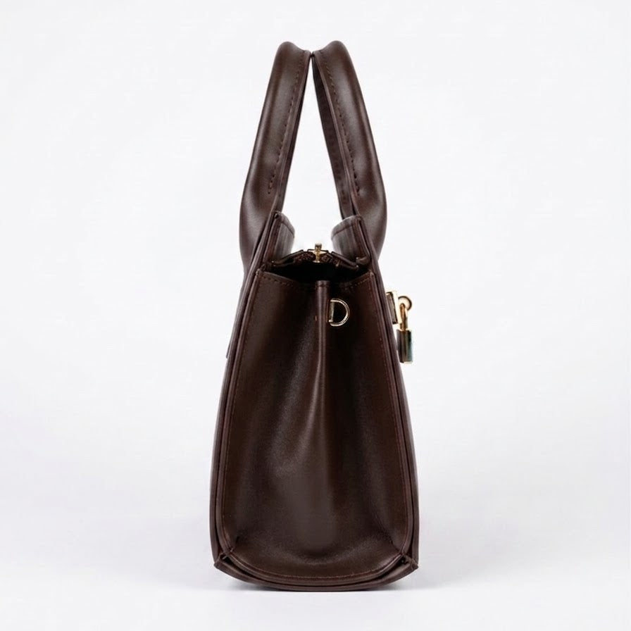 Side profile of brown mini top handle bag