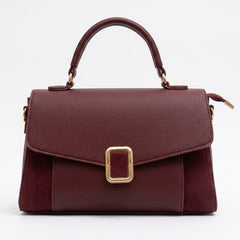 Burgundy suede and leather top handle flap bag, front view with gold buckle