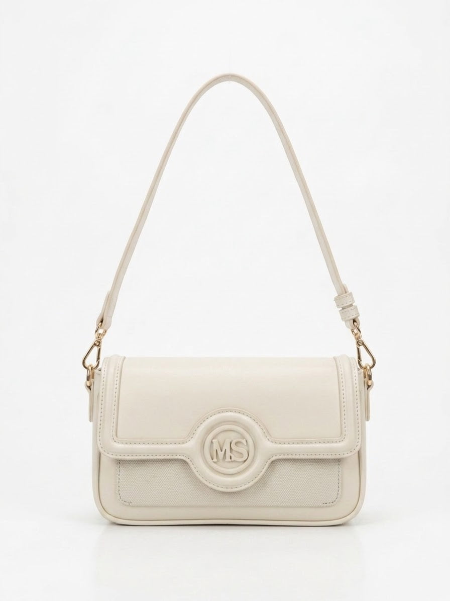 Cream monogram flap shoulder bag, front view with adjustable strap