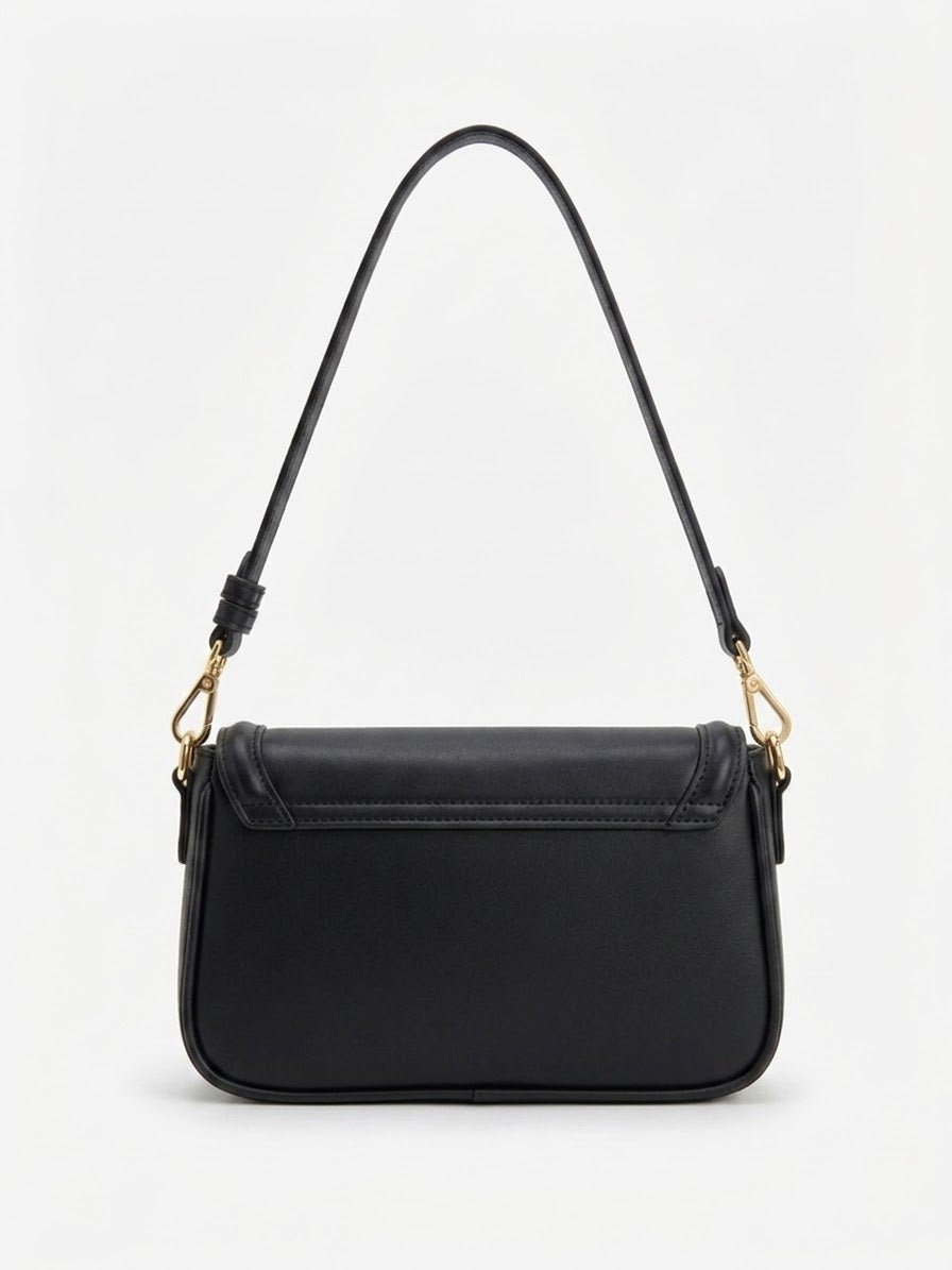 Back view of black flap shoulder bag