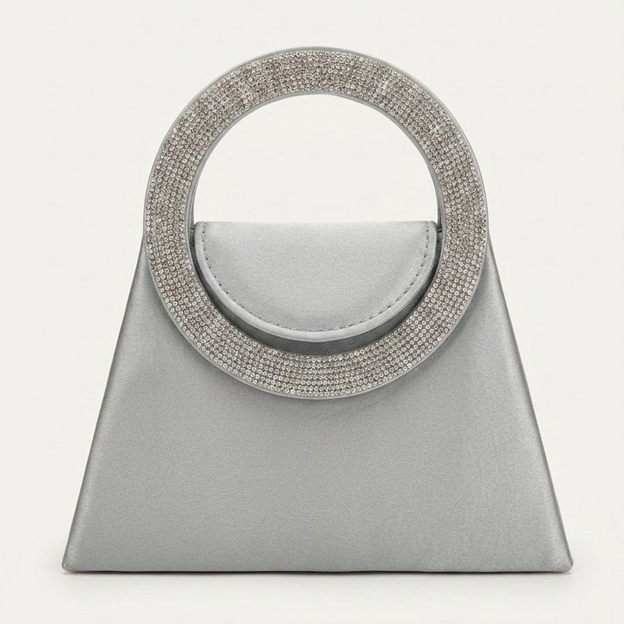 Silver satin trapeze evening bag with crystal ring handle, front view