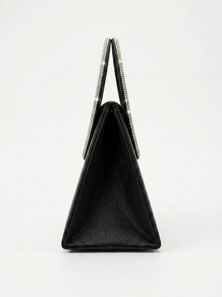 Side profile of black satin trapeze bag