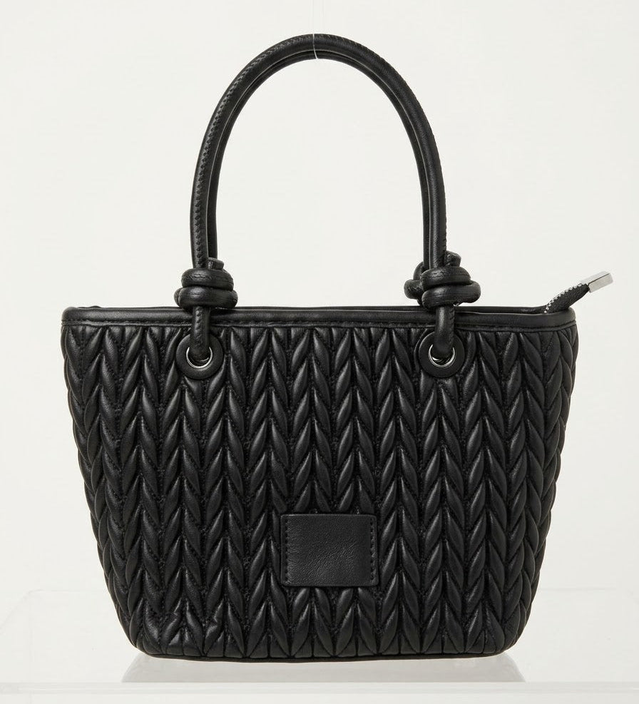 Black chevron quilted tote bag with knotted handles, front view