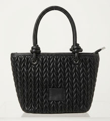 Black chevron quilted tote bag with knotted handles, front view