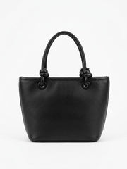 Back view of black quilted tote with knotted handles
