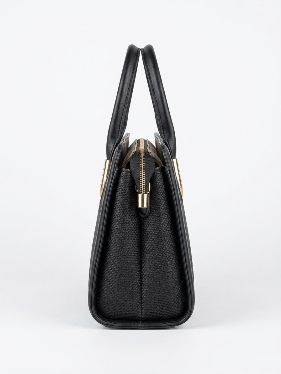 Side profile of black woven texture frame handbag