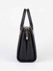 Side profile of black woven texture frame handbag