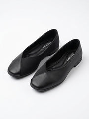 Pair of black square toe ballet flats