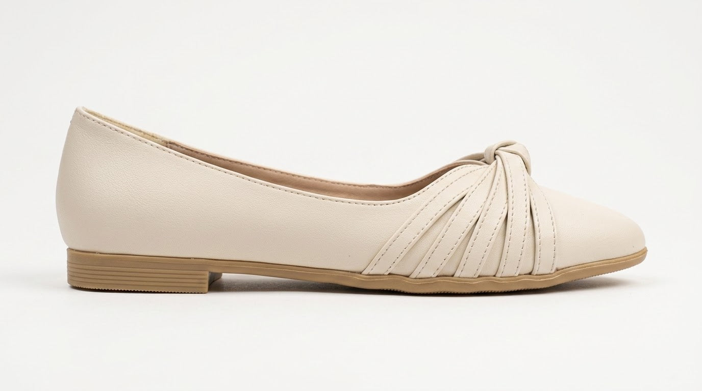 Cream knot bow pointed ballet flat, side view