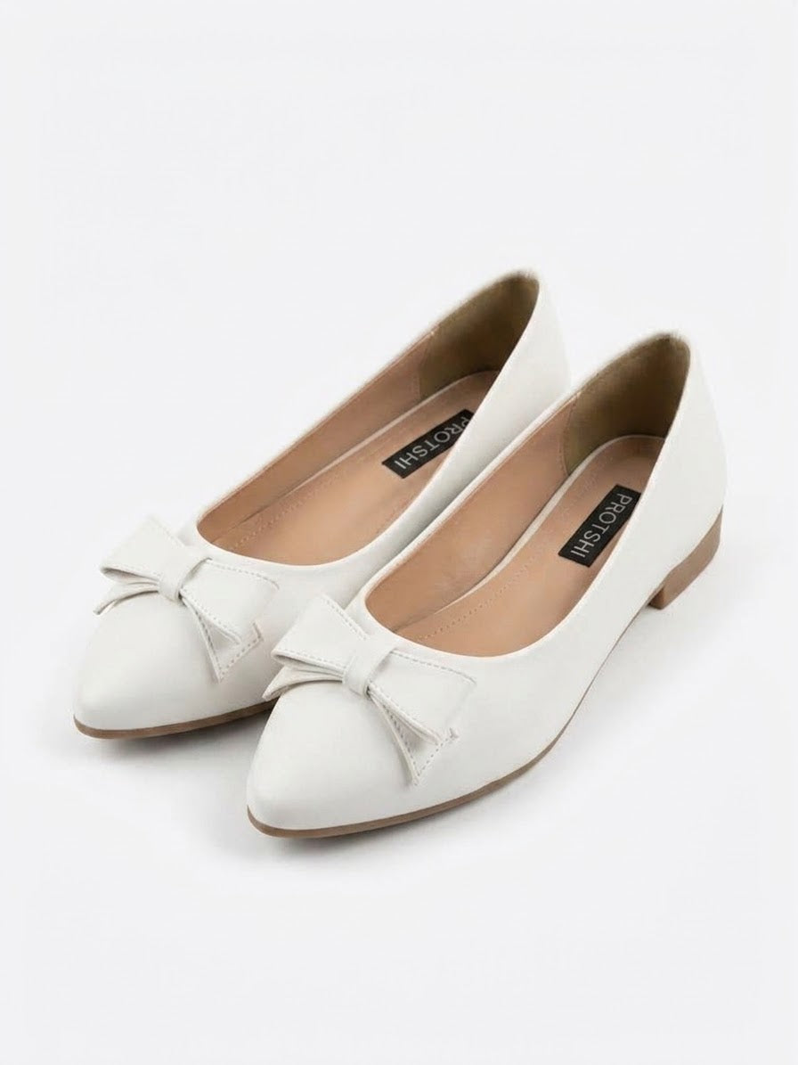 Pair of white bow pointed ballet flats