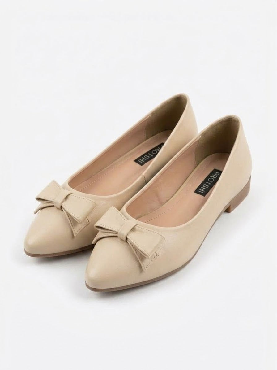 Pair of nude bow pointed ballet flats