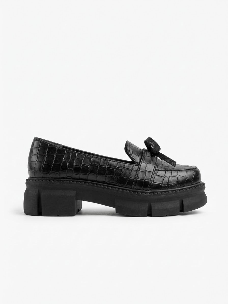 Black croc-embossed chunky lug sole bow loafer, side view