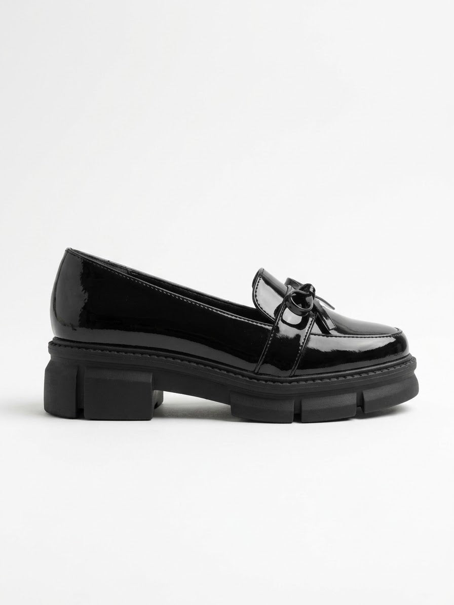 Black patent chunky lug sole bow loafer, side view