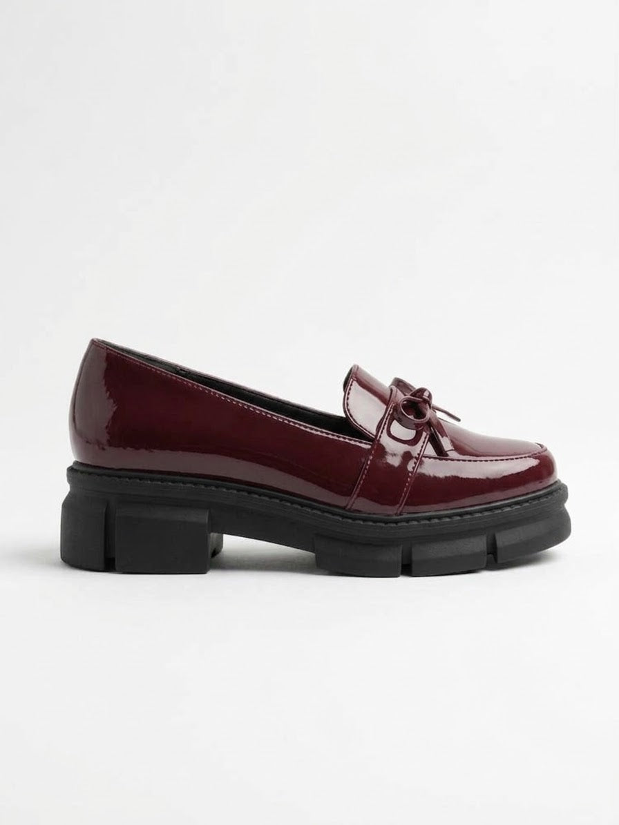 Burgundy patent chunky lug sole bow loafer, side view