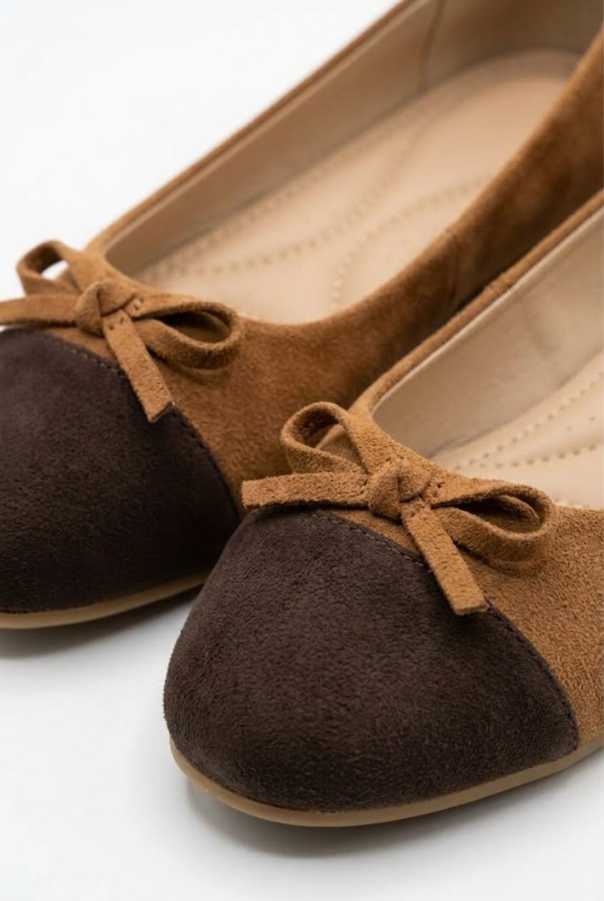 Close-up of the suede bow and padded insole, camel and brown