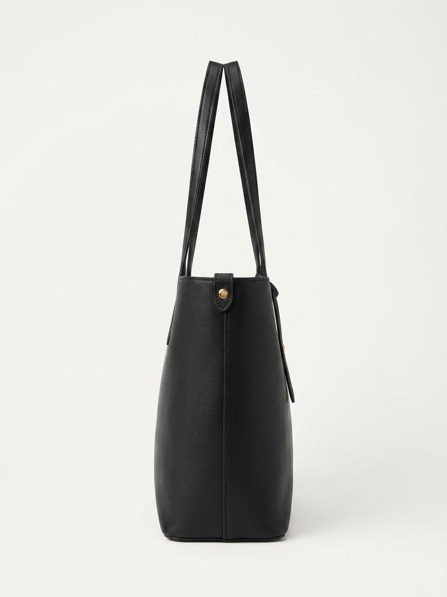 Side profile of black textured shopper 