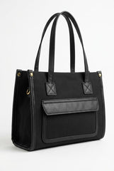 Black canvas tote with front flap pocket, front view